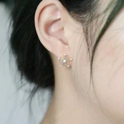 Flash-uitverkoop ⭐ CiCi'De Jewelry Amsterdam Bauhinia-gedetailleerd Ontwerp Elegante Bloem Oorstekers - Goud Vermeil - Natuurlijke Hemelsblauwe Topaas 🧨 -Sieraden-horloges Verkoop 550x738 1