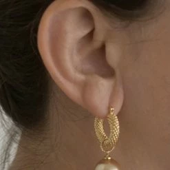 Kopen ⌛ JUNI Oorbellen JUNIoorbellen - JUNI Parel Oorbellen - Goud JUNI Pearl Oorbellen - Gold 🎁 -Sieraden-horloges Verkoop 550x760 1